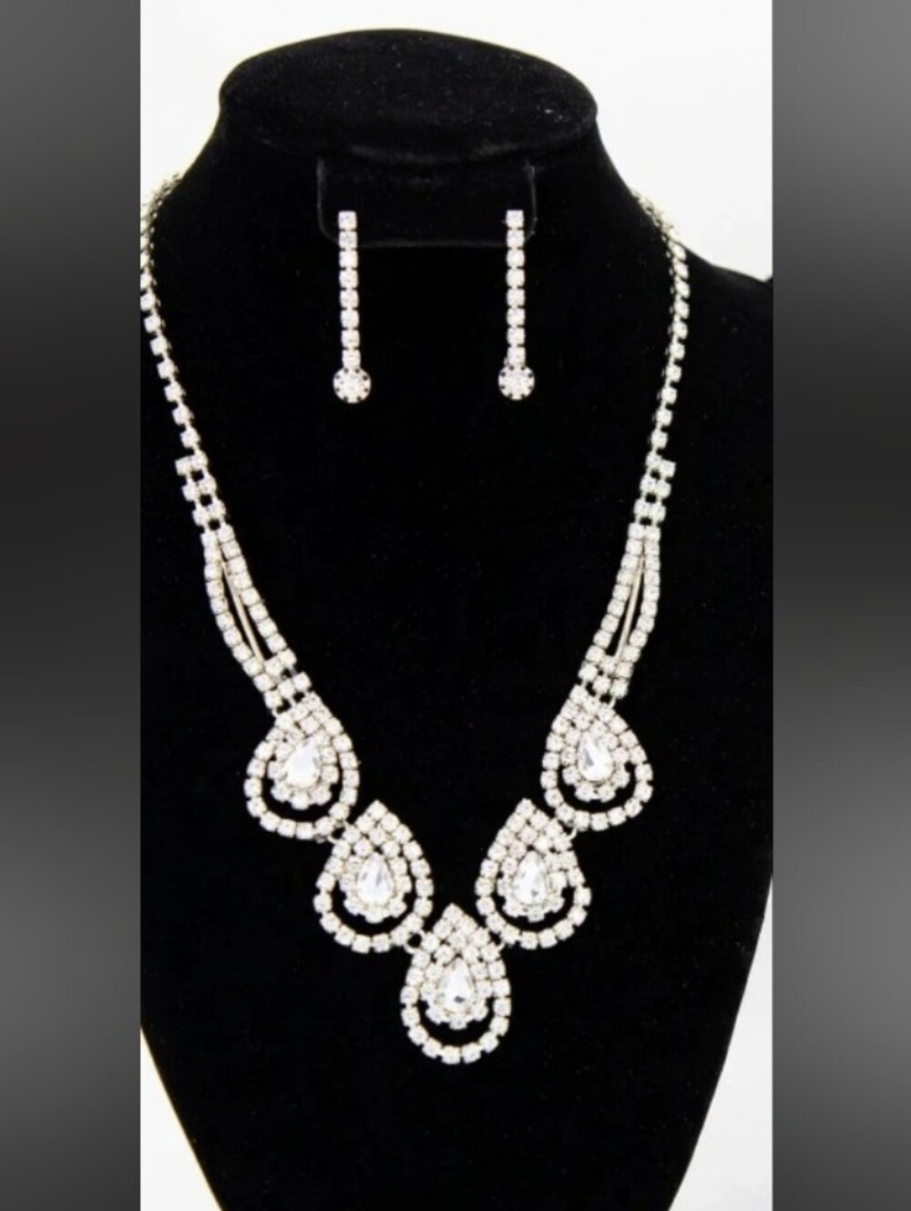 2/$40.      Crystal Teardrop Statement Necklace and Earring Set - Silver